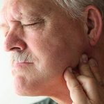 Воспаление челюстного сустава: причины, симптомы и лечение